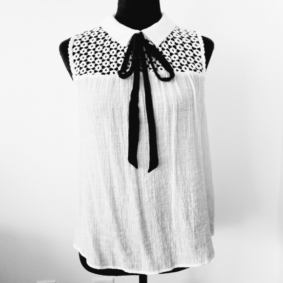 Sweet Wanderer Tops - Sweet Wanderer White Sleeveless Blouse, crochet - tie neck upper design. Size L